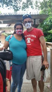 Masked adults, zoo family outing